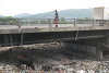 IMAJINE graffiti made by Joseph Constant & Claudel Casseus under flyover Port-au-Prince, Haiti: 2010