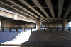 IMAGINE Graffiti in Arabic made by Bill Drummond, for DAMASCUS-in-LONDON, under the E Cross Route (A12) flyover over the River Lea, Hackney Wick, London: 2012. Photograph: Tracey Moberly